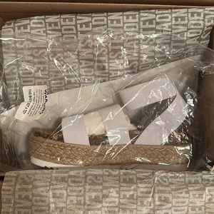 white Steve Madden sandals